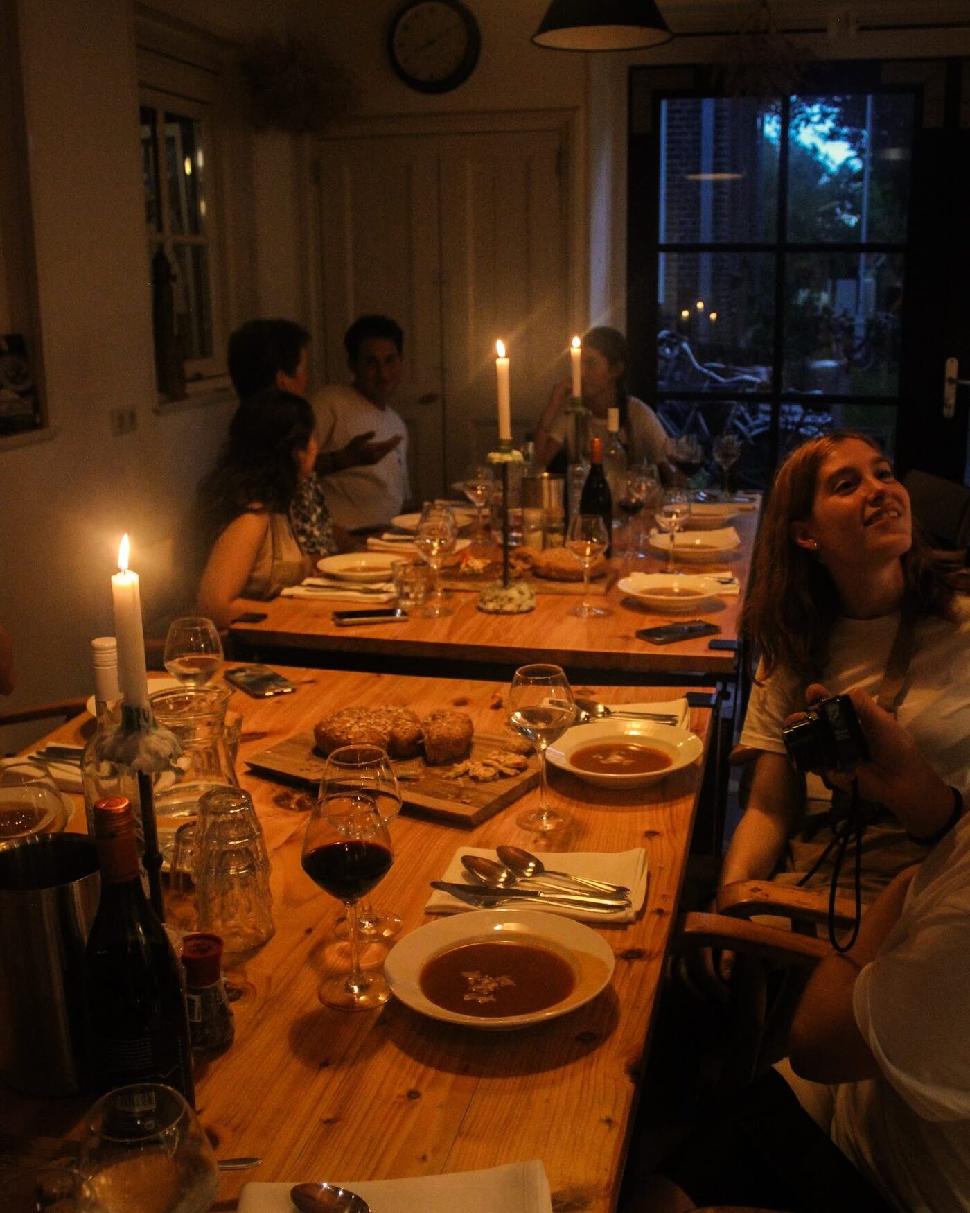 A long candlelit dinner table